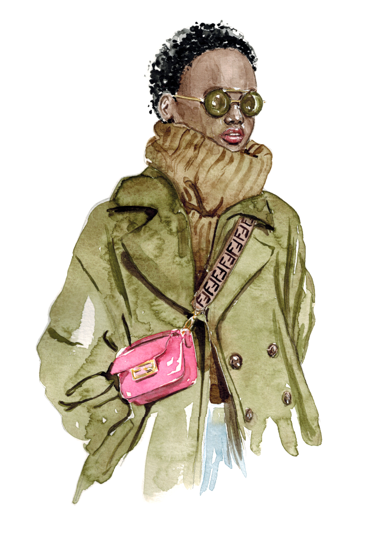 schwarze Frau mit Sonnenbrille in einem grünen Strickrollkragenpullover und einem grünen Mantel trägt eine pinke Fendi Handtasche